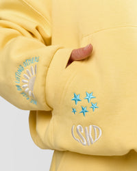 Woman wearing Zola Oversized Hoodie - Lemon | Model:Issy | Size:S | Thumbnail Index: 3