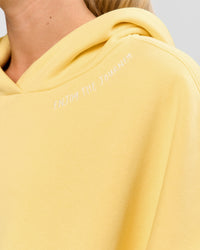 Woman wearing Zola Oversized Hoodie - Lemon | Model:Issy | Size:S | Thumbnail Index: 9