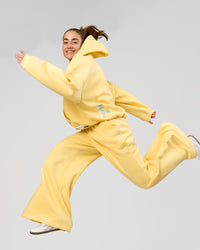 Woman wearing Zola Wide Leg Lounge Pant - Lemon | Model:Grace | Size:S | Thumbnail Index: 0