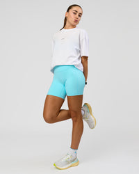 Woman wearing Run Like The Wind FLXCotton Oversized Tee - White-Future Navy | Model:Grace | Size:S | Thumbnail Index: 5