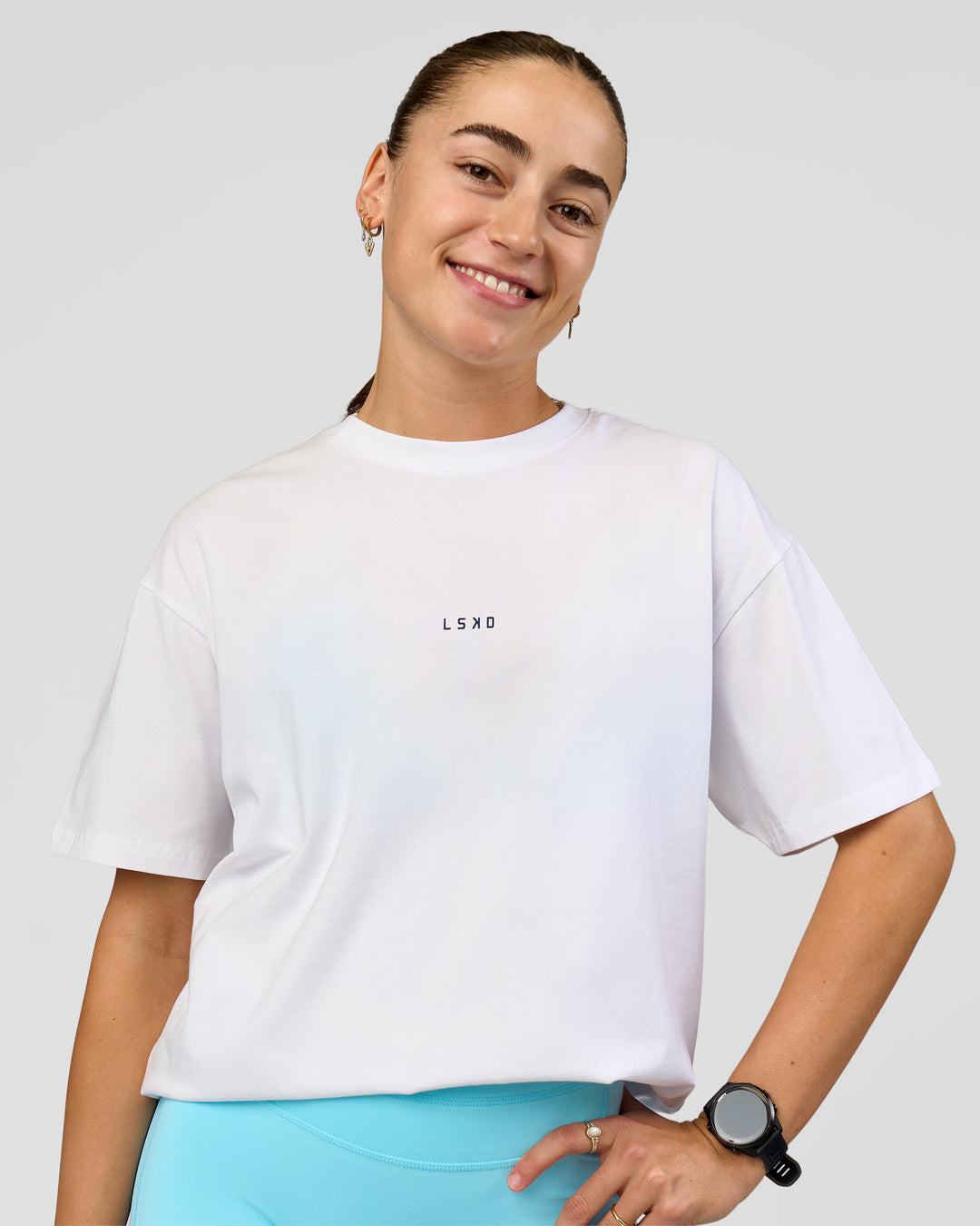 Woman wearing Run Like The Wind FLXCotton Oversized Tee - White-Future Navy | Model:Grace | Size:S - view 9