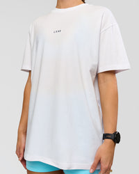 Woman wearing Run Like The Wind FLXCotton Oversized Tee - White-Future Navy | Model:Grace | Size:S | Thumbnail Index: 9