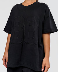 Woman wearing 86 V-Neck Oversized Tee - Black-Black | Model:Sophia | Size:S  | Thumbnail Index: 13