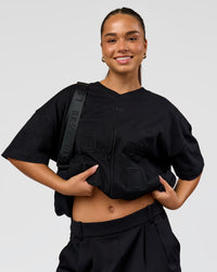 Woman wearing 86 V-Neck Oversized Tee - Black-Black | Model:Sophia | Size:S  | Thumbnail Index: 8