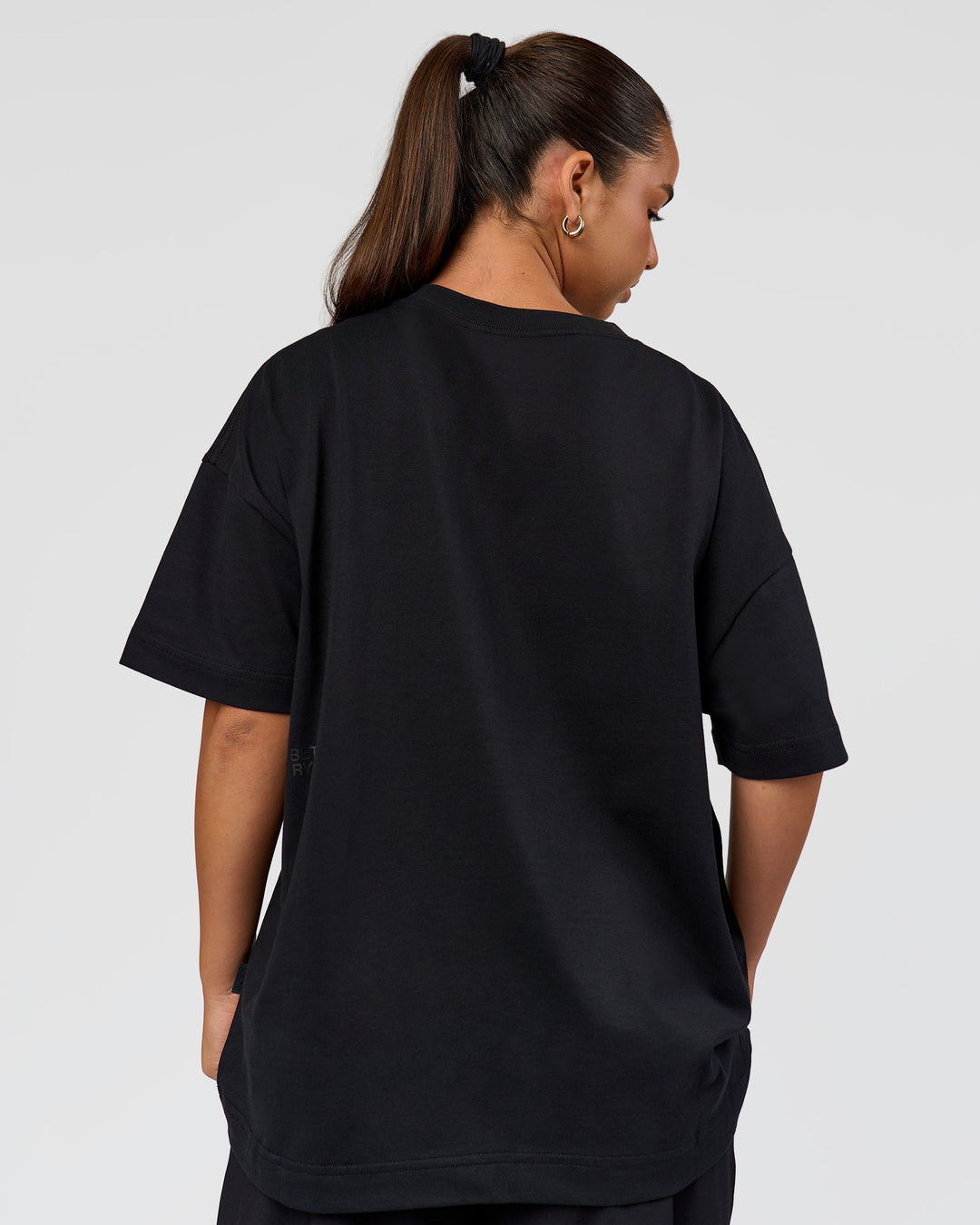 Woman wearing 86 V-Neck Oversized Tee - Black-Black | Model:Sophia | Size:S | - view 10