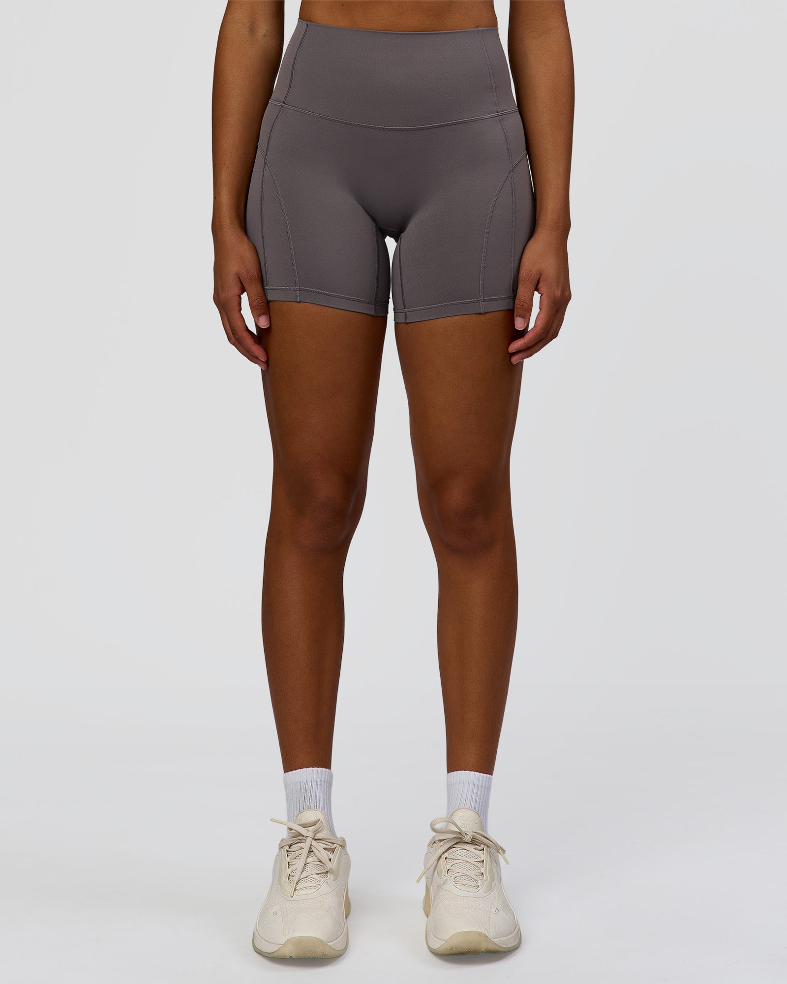 Woman wearing Bend High-Rise 4" Short - Duskstone | Model:Rosie | Size:S