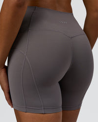 Woman wearing Bend High-Rise 4" Short - Duskstone | Model:Rosie | Size:S | Thumbnail Index: 6
