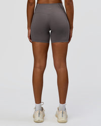 Woman wearing Bend High-Rise 4" Short - Duskstone | Model:Rosie | Size:S | Thumbnail Index: 3