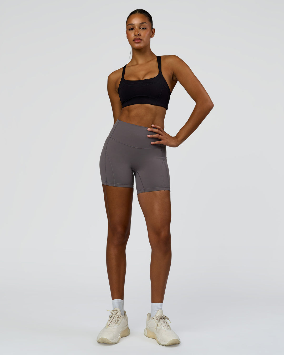 Woman wearing Inertia Sports Bra - Black | Model:Rosie | Size:S - view 7