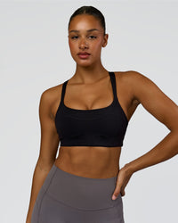 Woman wearing Inertia Sports Bra - Black | Model:Rosie | Size:S | Thumbnail Index: 3