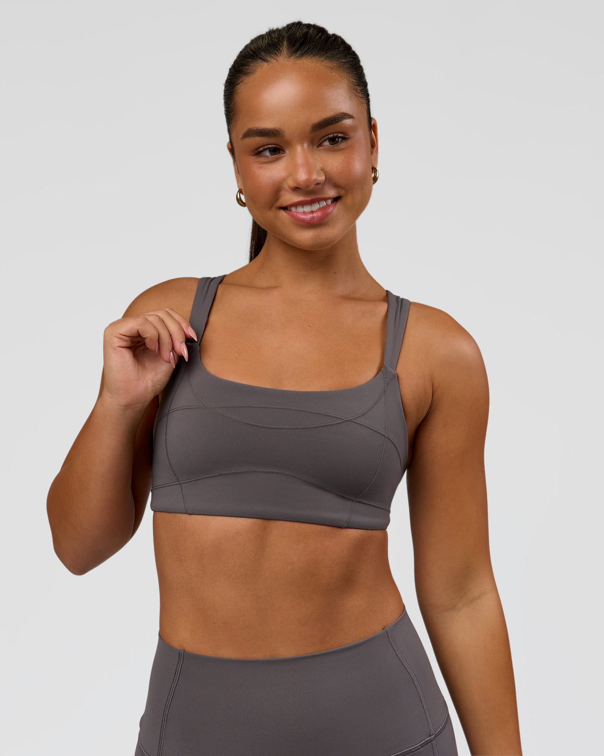Woman wearing Inertia Sports Bra - Duskstone | Model:Rosie | Size:S