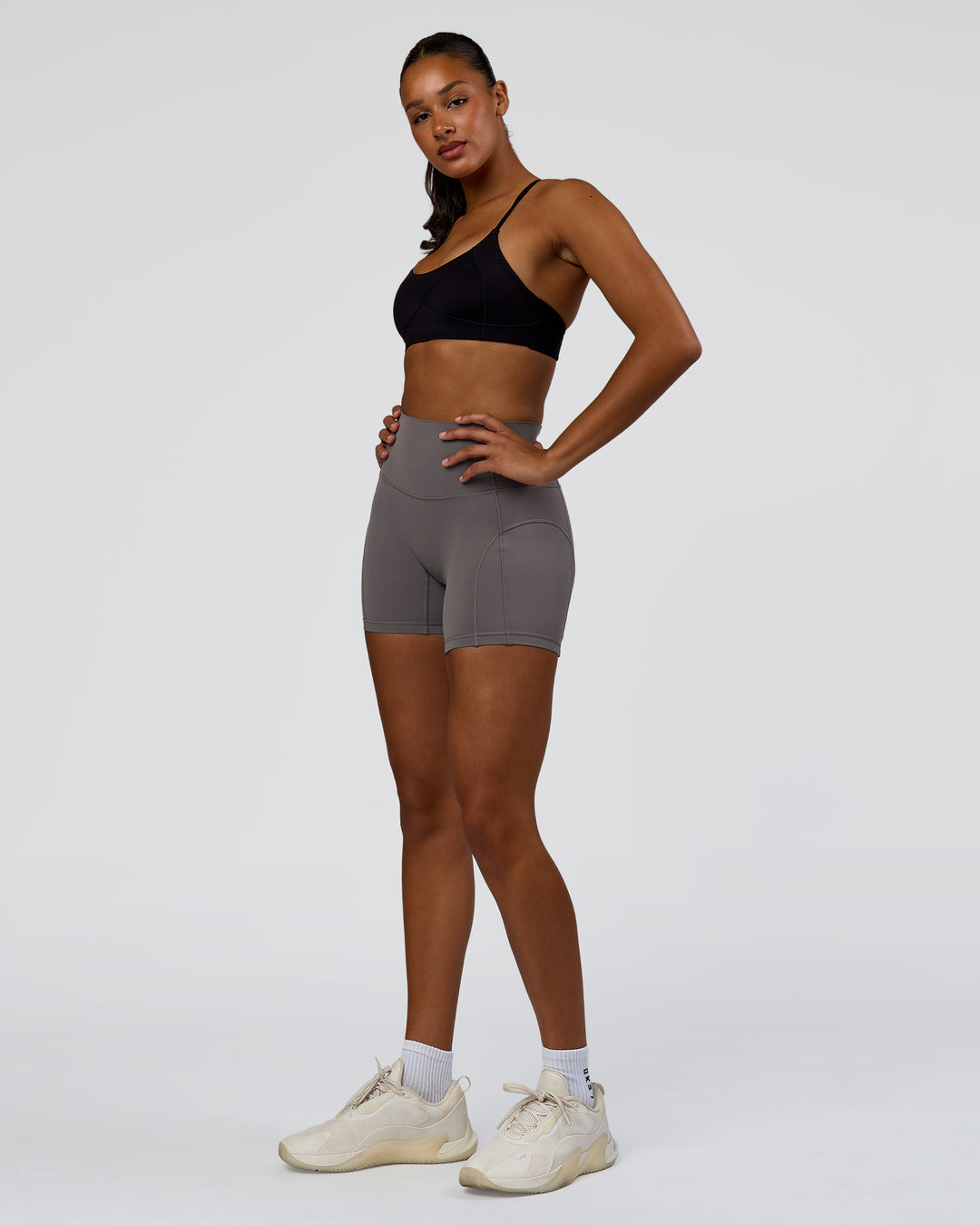 Woman wearing Infinite Contour Sports Bra - Black | Model:Rosie | Size:S - view 7