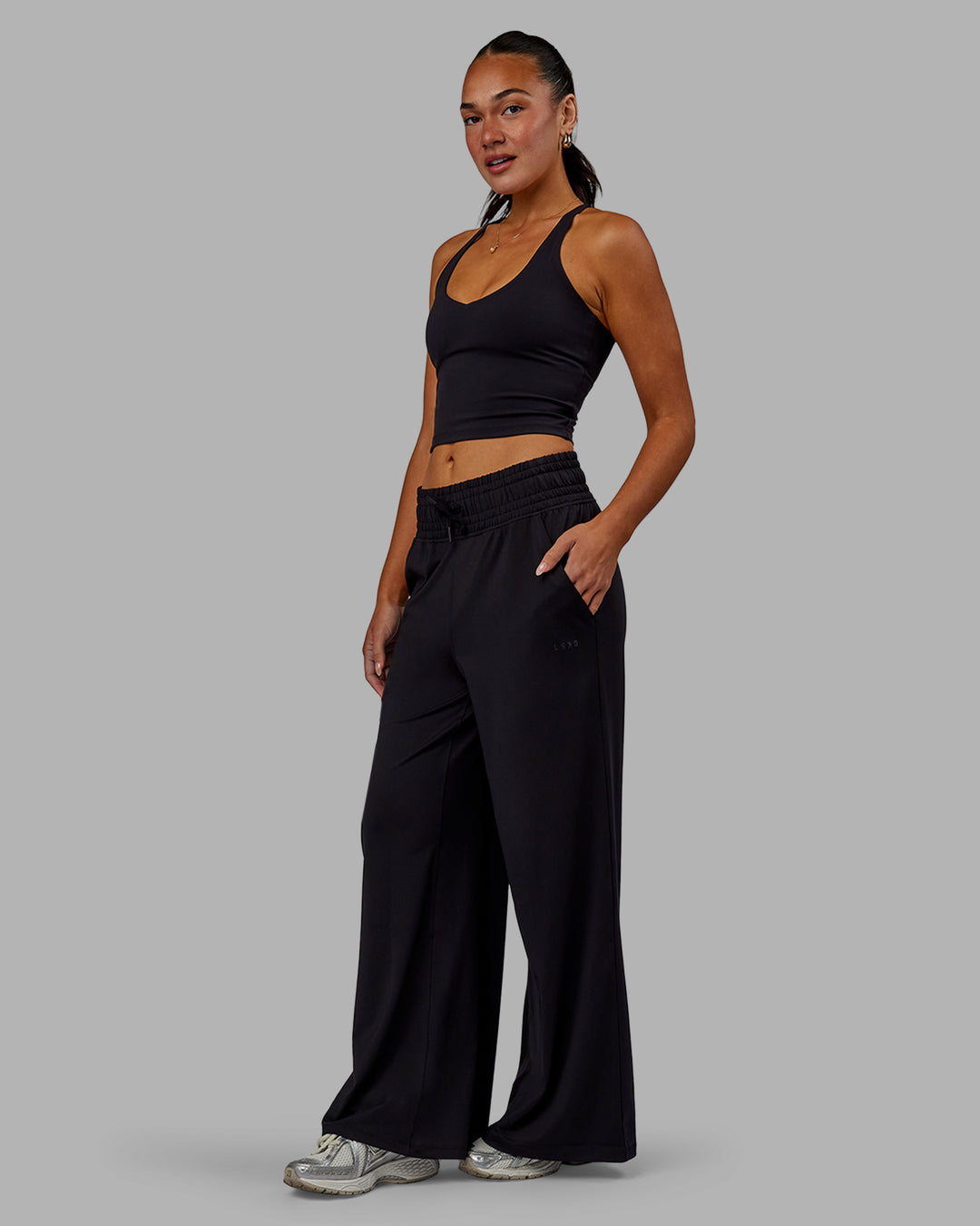 Woman wearing Restore CloudFLX Wide Leg Pants - Black - view 1