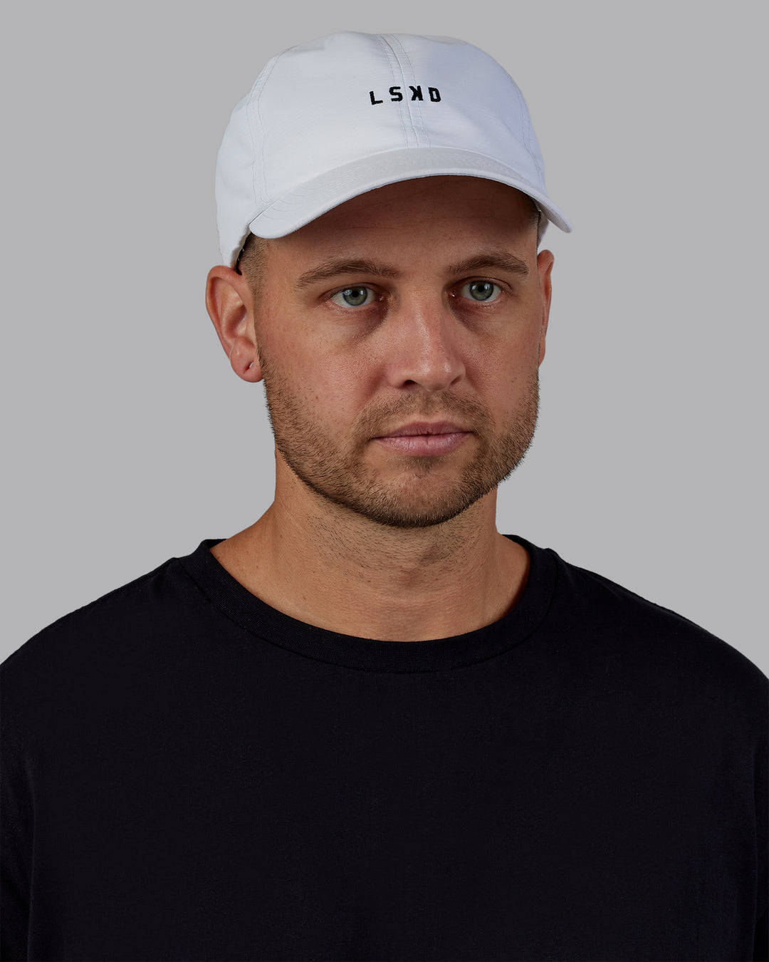 Man wearing Train Cap - White-Black | Model:Macca | Size:OS - view 1