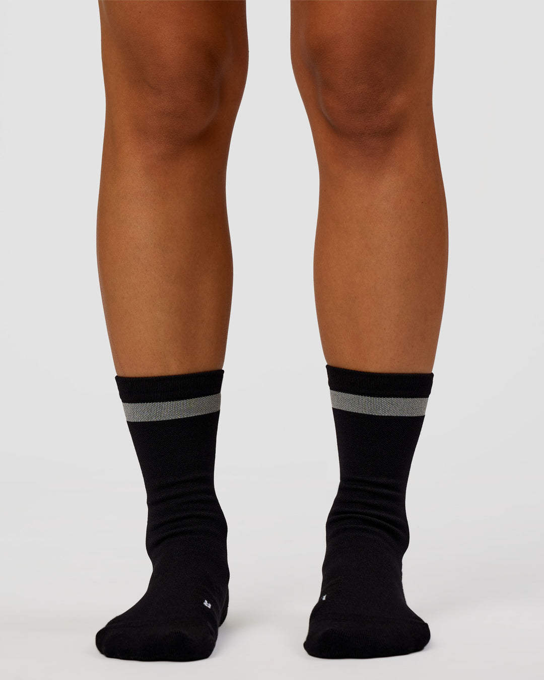 Woman wearing Run Club Fast Performance Socks 2.0 - Black-Reflective - view 7