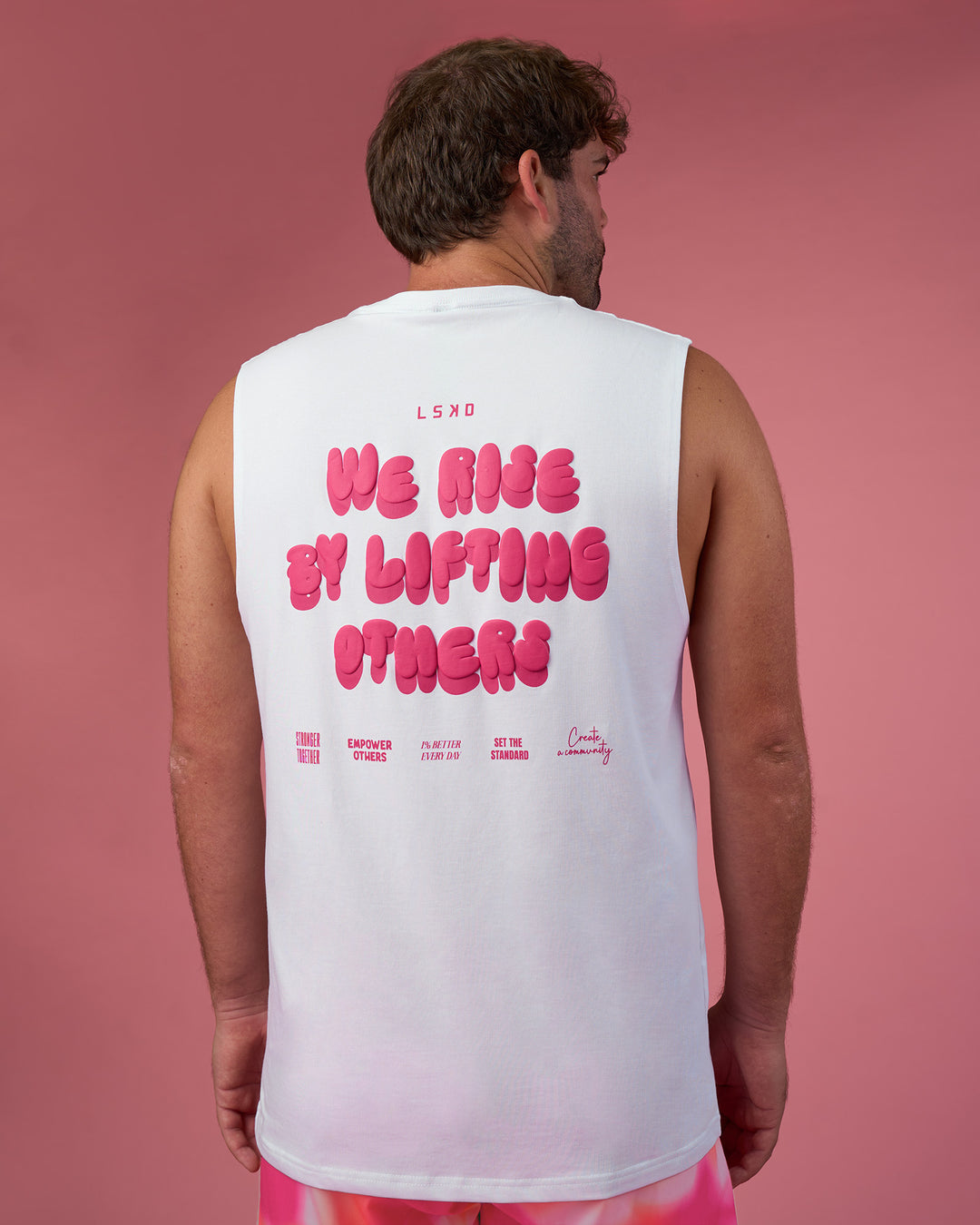 Man wearing BCAM FLXCotton Muscle Tank - White-Ultra Pink | Model:Fletcher | Size:XL - view 1