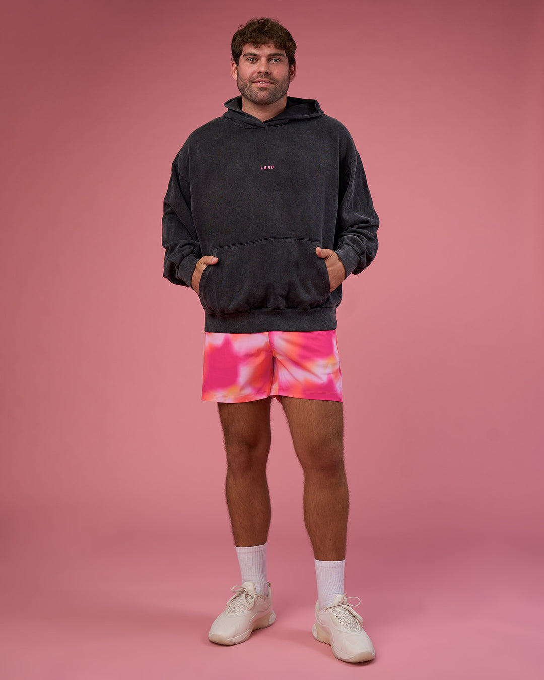 Man wearing BCAM Washed Unisex Oversized Hoodie - Black Washed-Pink | Model:Fletcher | Size:XL - view 9