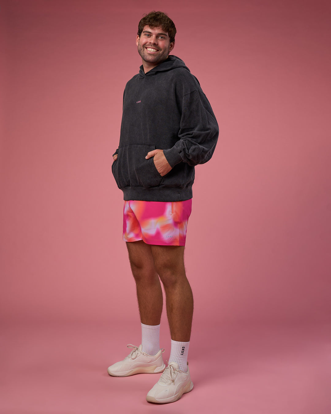 Man wearing BCAM Washed Unisex Oversized Hoodie - Black Washed-Pink | Model:Fletcher | Size:XL - view 13