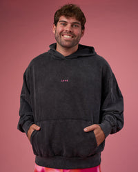 Man wearing BCAM Washed Unisex Oversized Hoodie - Black Washed-Pink | Model:Fletcher | Size:XL | Thumbnail Index: 4