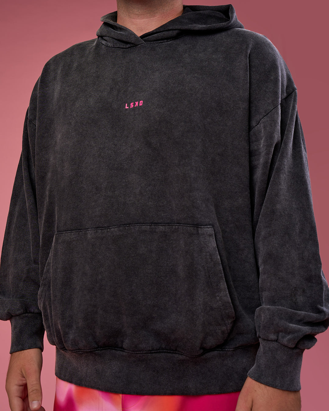 Man wearing BCAM Washed Unisex Oversized Hoodie - Black Washed-Pink | Model:Fletcher | Size:XL - view 2