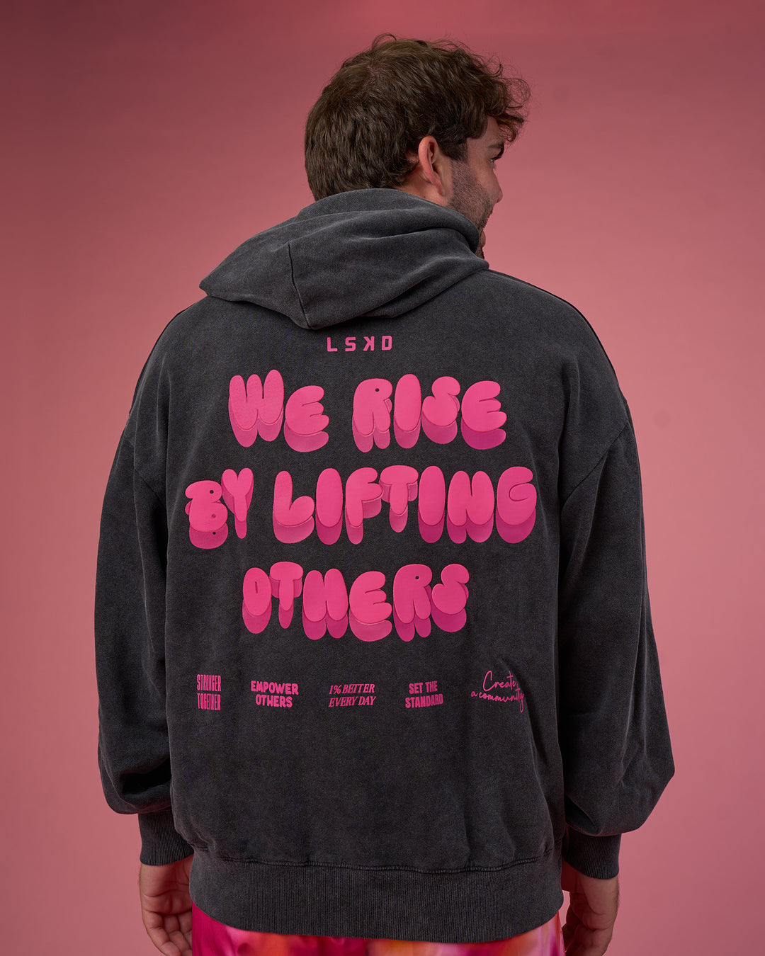 Man wearing BCAM Washed Unisex Oversized Hoodie - Black Washed-Pink | Model:Fletcher | Size:XL - view 7