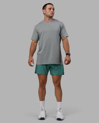 Man wearing Base FLXCotton Tee - Circular Grey | Thumbnail Index: 4