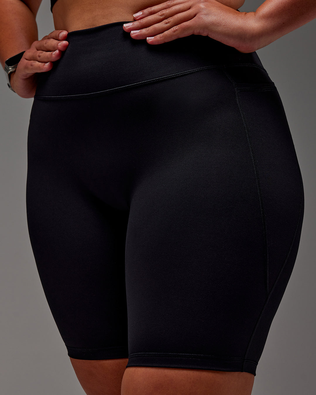 Woman wearing Fusion Ultra High-Rise 9" Short Pockets - Black | Model:Aimee | Size:XL - view 36