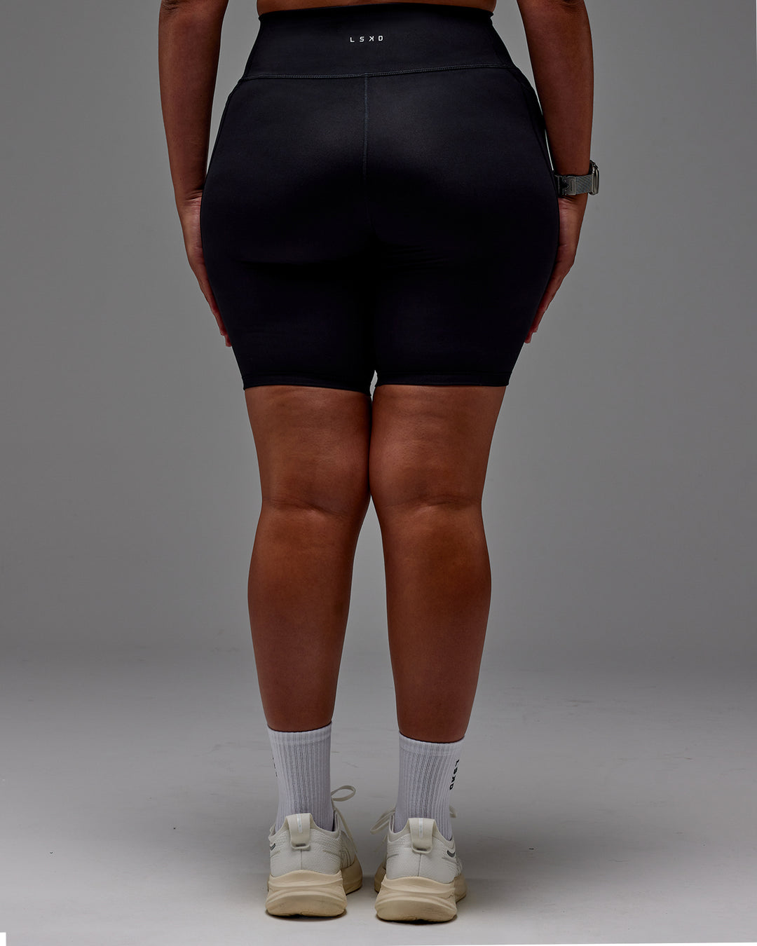 Woman wearing Fusion Ultra High-Rise 9" Short Pockets - Black | Model:Aimee | Size:XL - view 34