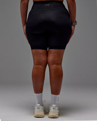 Woman wearing Fusion Ultra High-Rise 9" Short Pockets - Black | Model:Aimee | Size:XL | Thumbnail Index: 33
