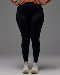 Woman wearing Fusion Ultra High-Rise Full Length Legging Pockets - Black | Model:Aimee | Size:XL | Thumbnail Index: 16
