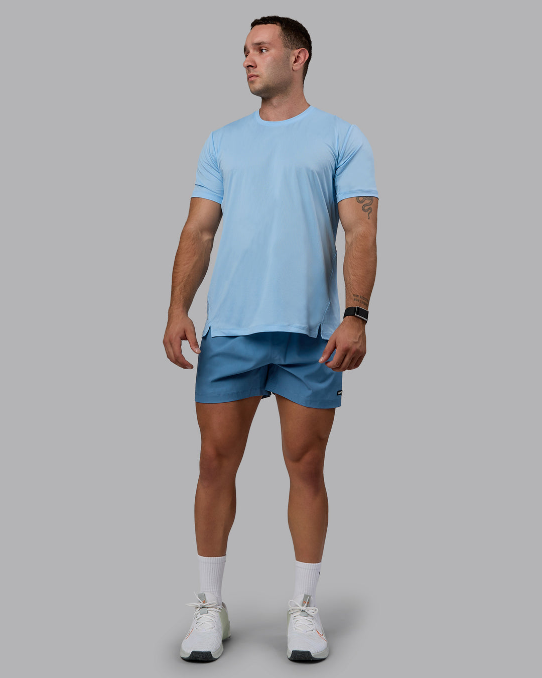 Man wearing Pace Running Tee - Glacial Blue - view 1