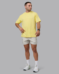 Man wearing Unisex Enjoy the Journey Value Series FLXCotton Tee Oversize - Pale Yellow-Sundress | Thumbnail Index: 10
