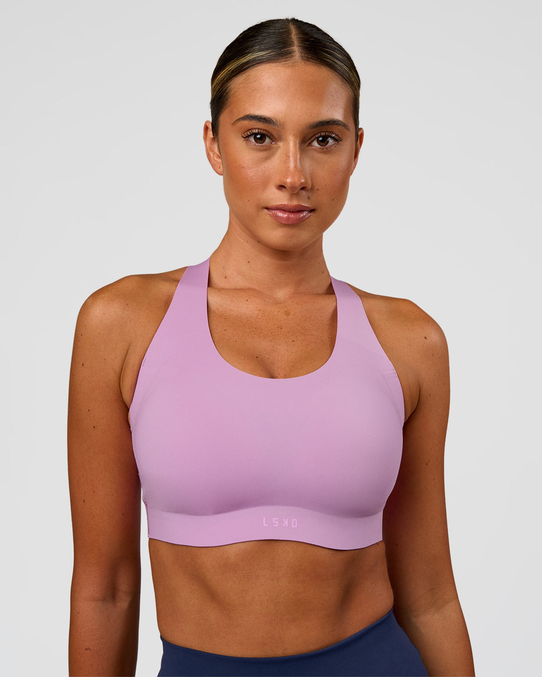 Woman wearing Stability High Support Sports Bra - Light Violet | Model:Charli | Size:XS (A-C Cup) - view 1