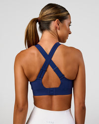 Woman wearing Stability High Support Sports Bra - Midnight Blue | Model:Charli | Size:XS (A-C Cup) | Thumbnail Index: 4