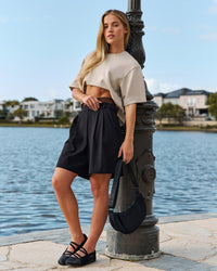 Woman wearing AfterDark ZeroCrease Cropped Tee - Shale Beige | Model:Issy | Size:XS | Thumbnail Index: 3