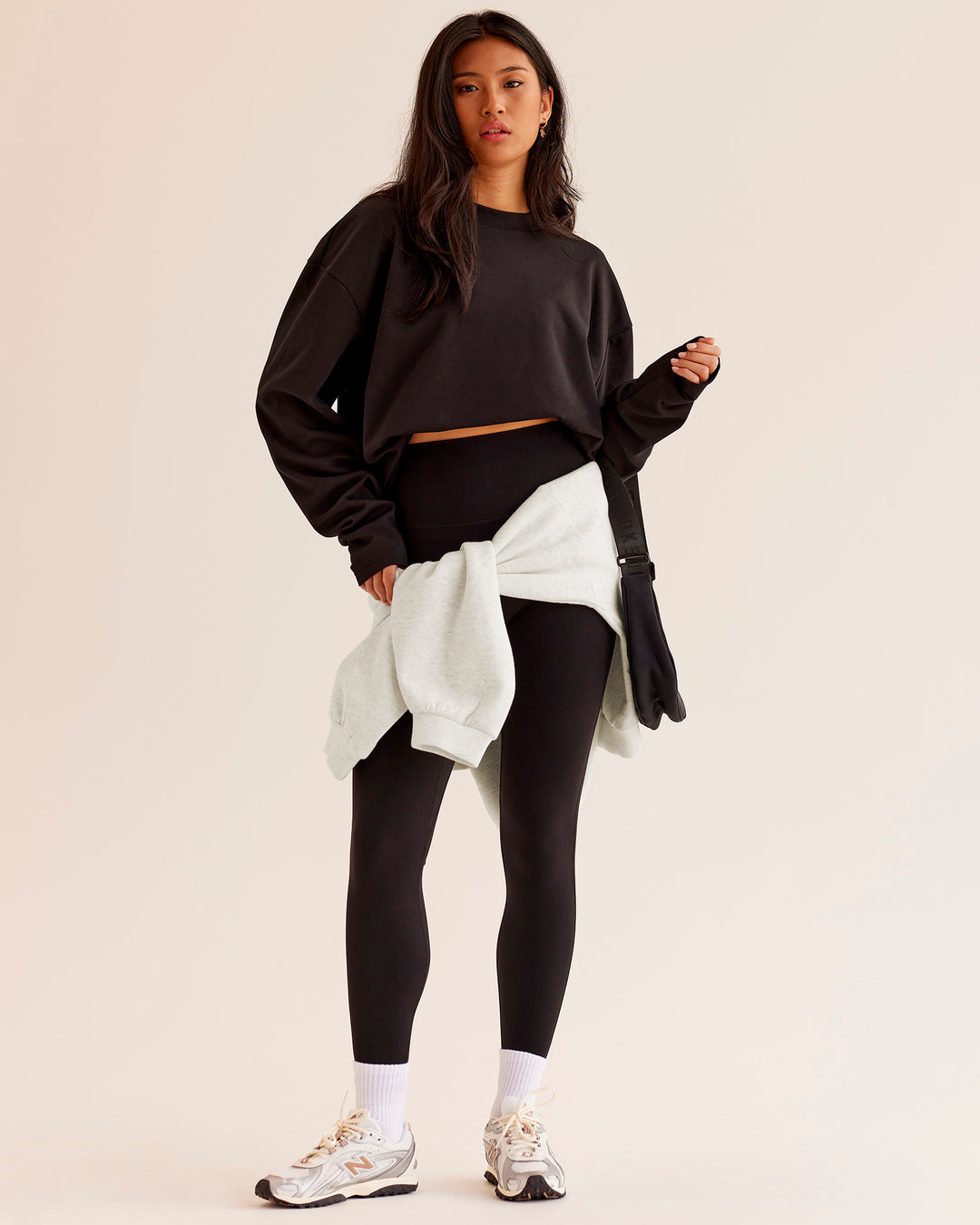 Woman wearing AfterDark ZeroCrease Long Sleeve Tee - Black | Model:Loren | Size:XS - view 4