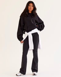 Woman wearing AfterDark ZeroCrease Oversized Hoodie - Black | Model:Loren | Size:XS | Thumbnail Index: 4