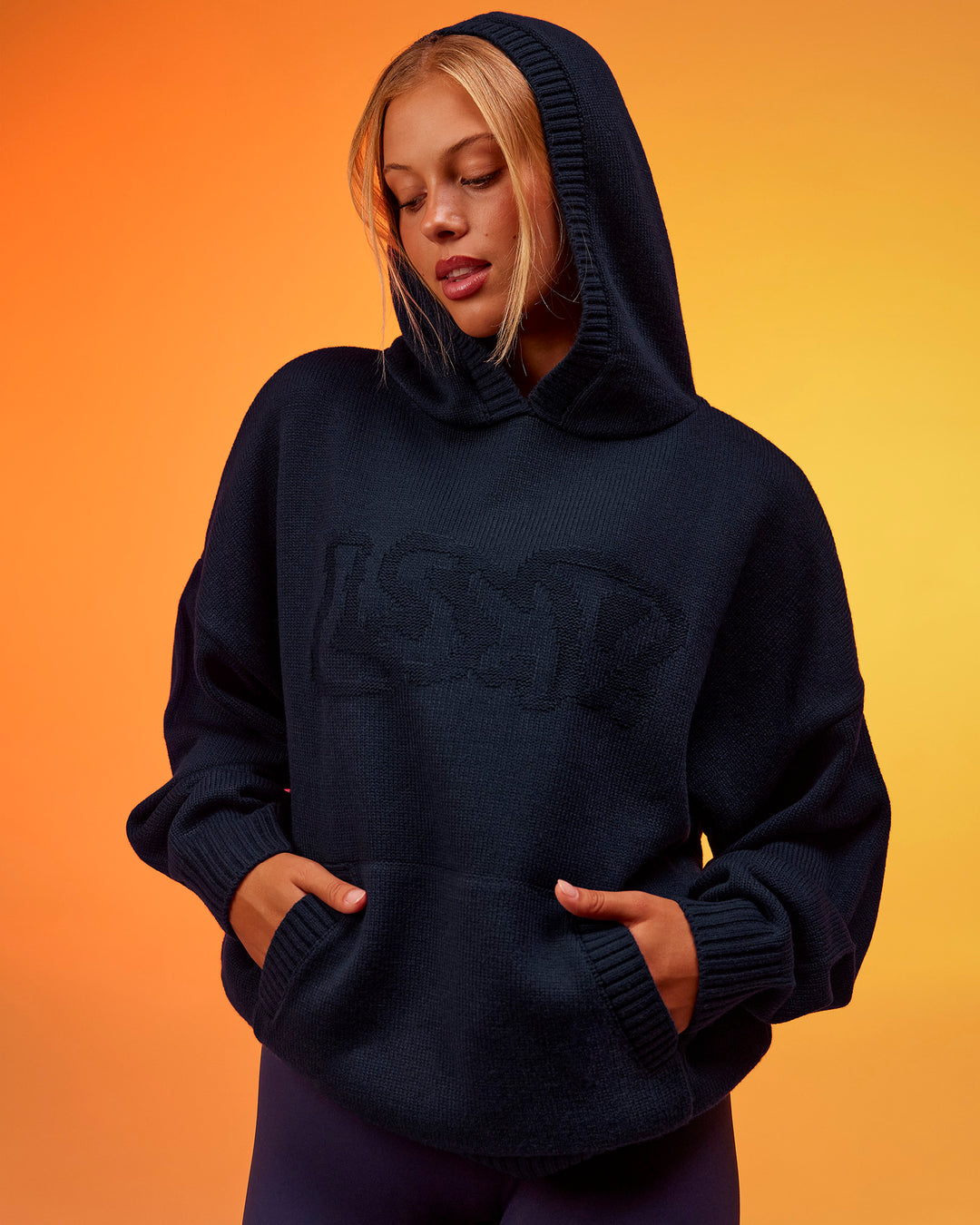 Woman wearing All Day Active Knitted Hoodie - Future Navy | Model:Hailey | Size:XS - view 2