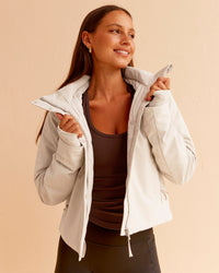 Woman wearing Auxiliary 2.0 Jacket - Shale Beige | Model:Brylee | Size:XS | Thumbnail Index: 0