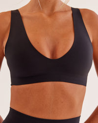 Woman wearing Bend & FLX Plunge Sports Bra - Black | Model:Georgia | Size:XS | Thumbnail Index: 9