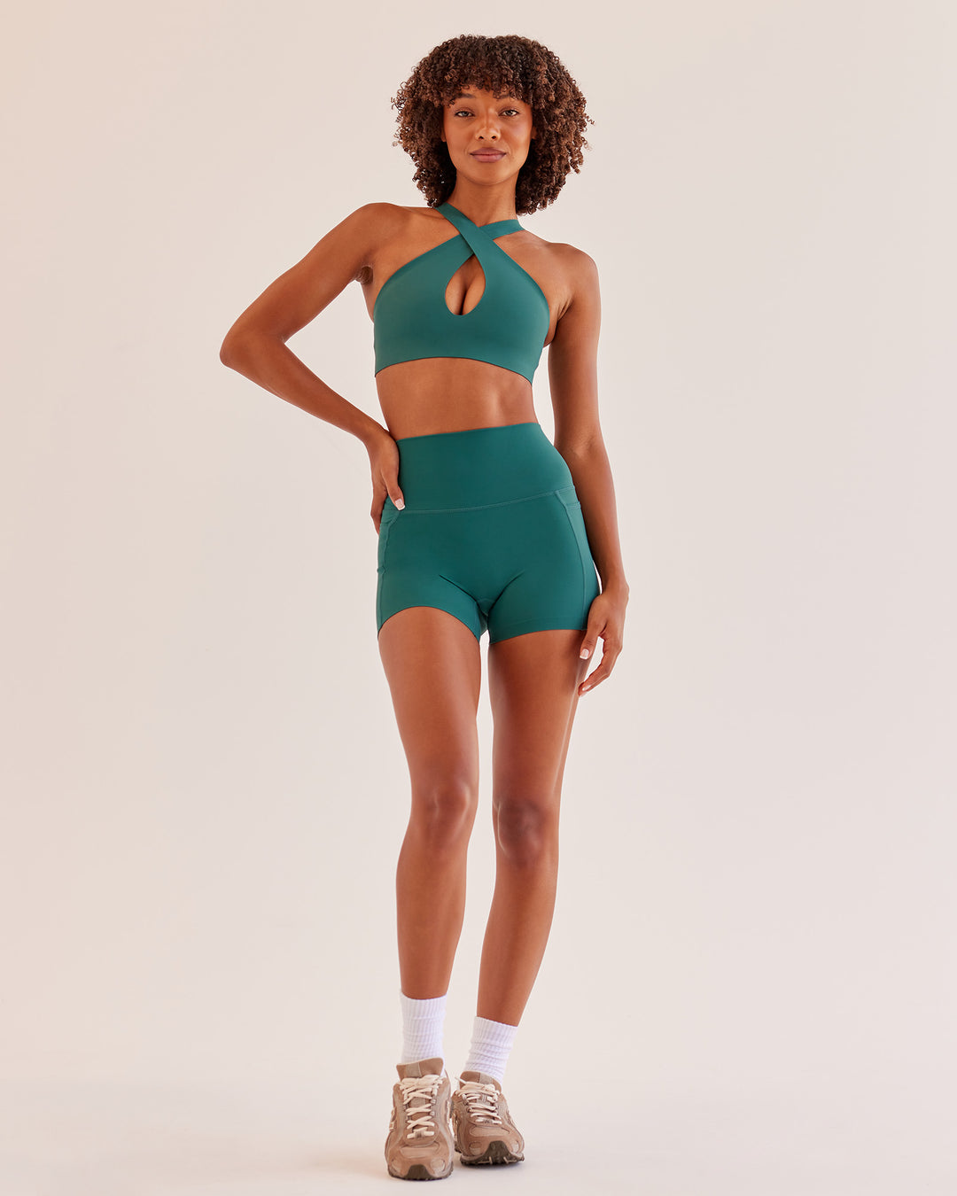 Woman wearing Bend &amp; FLX Plunge Sports Bra - Transformative Teal | Model:Tomi | Size:XS - view 8