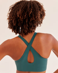 Woman wearing Bend & FLX Plunge Sports Bra - Transformative Teal | Model:Tomi | Size:XS | Thumbnail Index: 1
