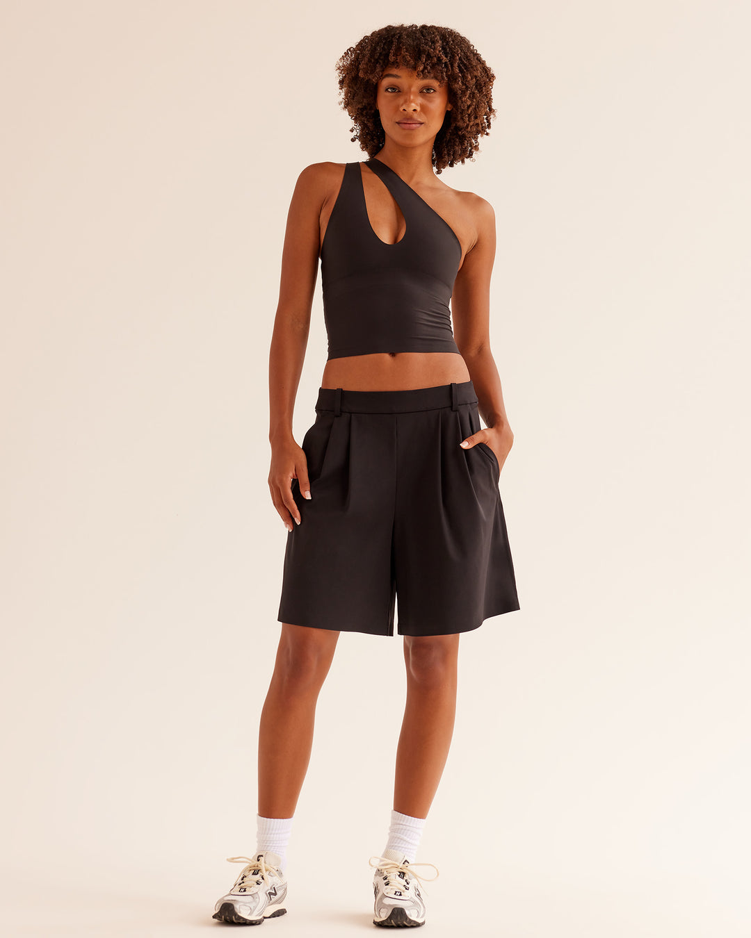 Woman wearing Bend &amp; FLX Plunge Tank - Black | Model:Tomi | Size:XS - view 3