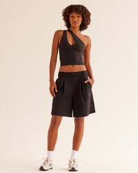 Woman wearing Bend & FLX Plunge Tank - Black | Model:Tomi | Size:XS | Thumbnail Index: 2