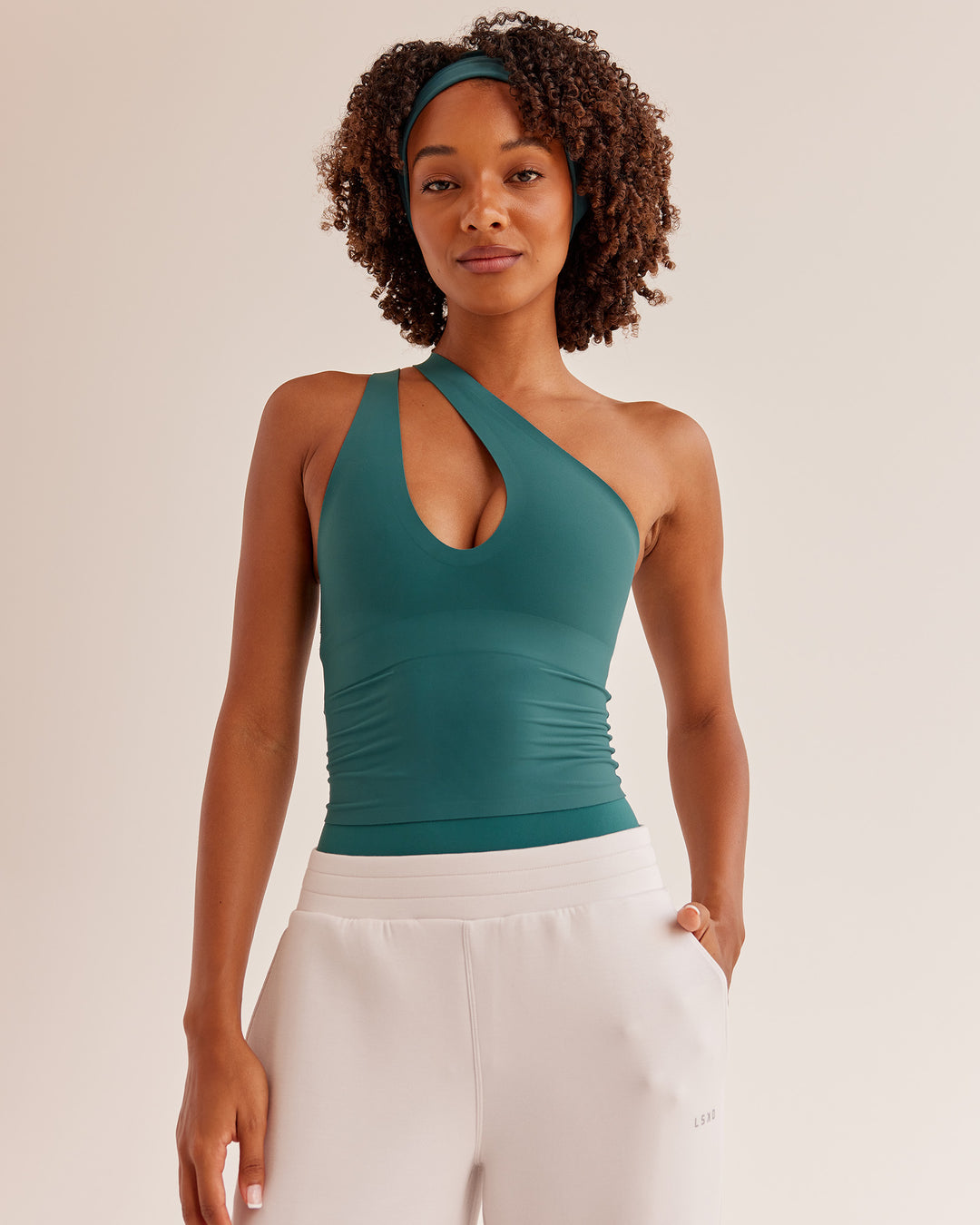 Woman wearing Bend &amp; FLX Plunge Tank - Transformative Teal | Model:Tomi | Size:XS - view 2