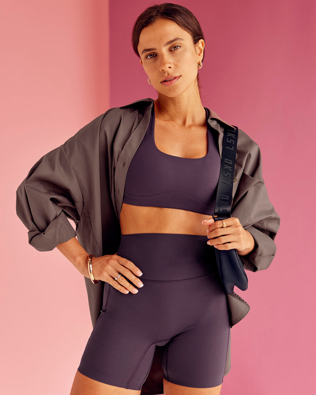 Woman wearing Elixir Ultra High-Rise 6” Short Pockets - Midnight Plum | Model:Bruna | Size:XS - view 2