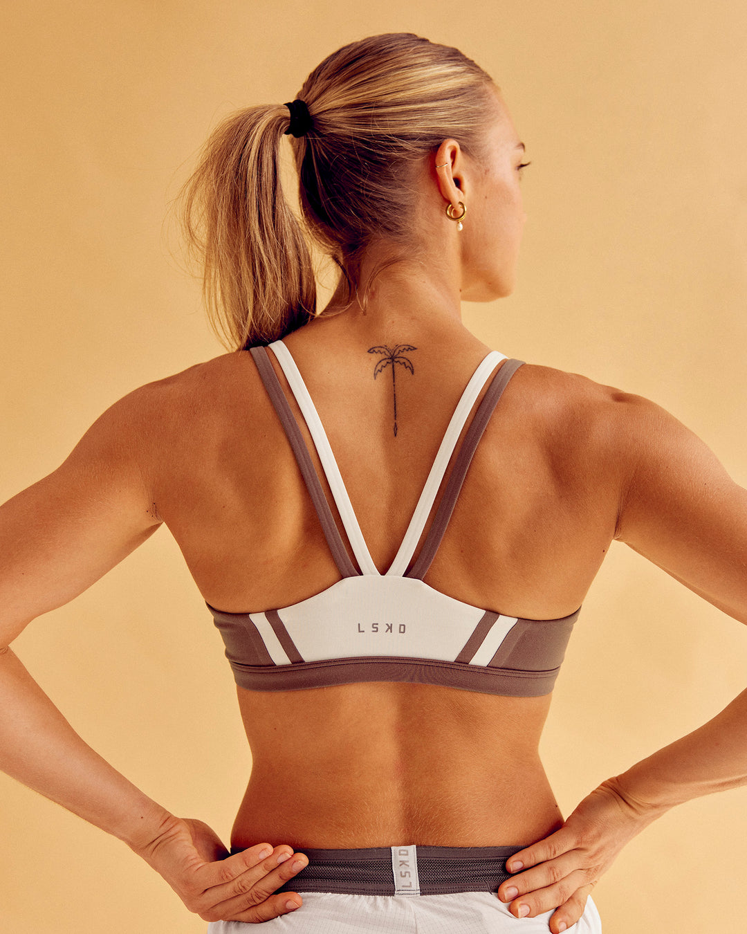 Woman wearing Force Sports Bra - Cocoa Powder-Off White | Model:Maja | Size:XS - view 5