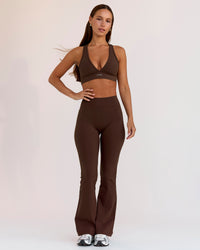 Woman wearing Fusion V-Contour High-Rise Flared Petite Legging Pockets - Hot Chocolate | Model:Brylee | Size:XS | Thumbnail Index: 9