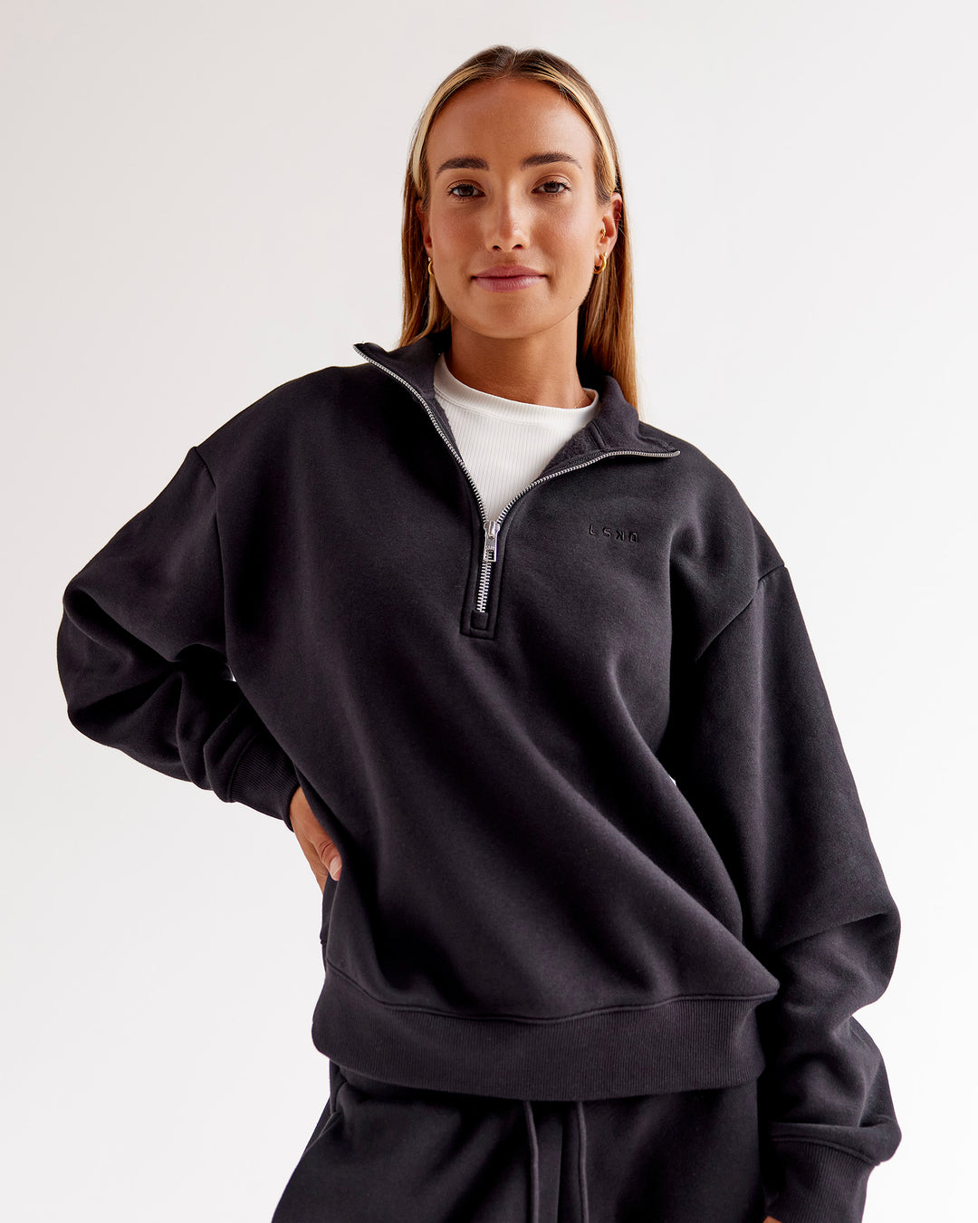 Woman wearing Go-To Oversized Quarter Zip Sweater - Black | Model:Jaimee | Size:XS - view 1