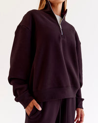 Woman wearing Go-To Oversized Quarter Zip Sweater - Midnight Plum | Model:Jaimee | Size:XS | Thumbnail Index: 0